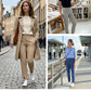 Hoge elastische broek voor dames met zakken met ritssluiting