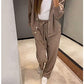 Tweedelige gebreide jas en broek voor dames met knopen