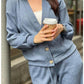 Tweedelige gebreide jas en broek voor dames met knopen