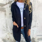Dames vest met capuchon en knoopjes