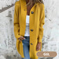 Dames vest met capuchon en knoopjes