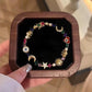 🌠 Hemelse Charms Armband — Zon, Maan & Kristallen | Elegant & Verfijnd ✨ -66% KORTING VANDAAG 🔥