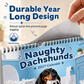50% KORTING – Wandkalender met Grappige Teckels – 12 Maanden Vol Ondeugende Honden & Humor